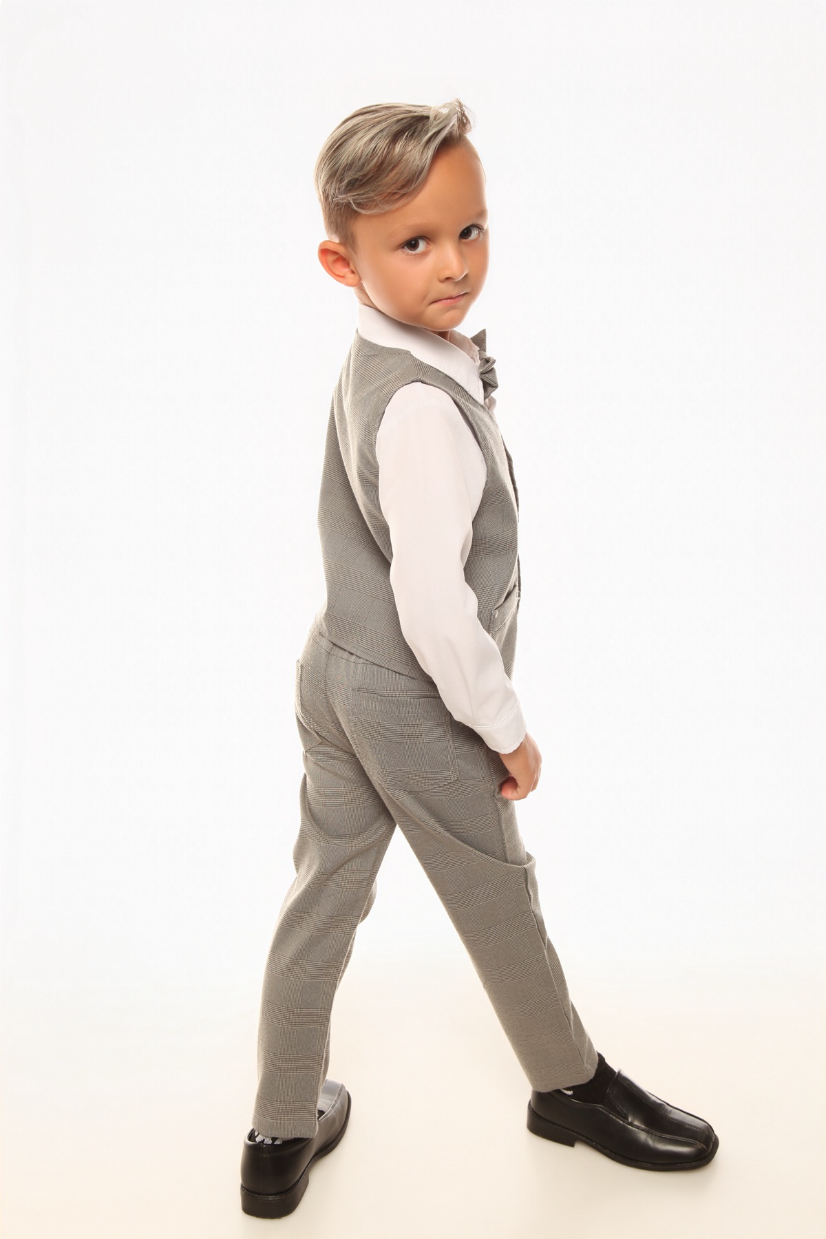 Formal look — gray vest with bow tie